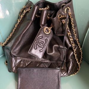 Authentic CHANEL black lamb skin bucket w/ wallet